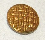 a basketweave finished gold color metal button